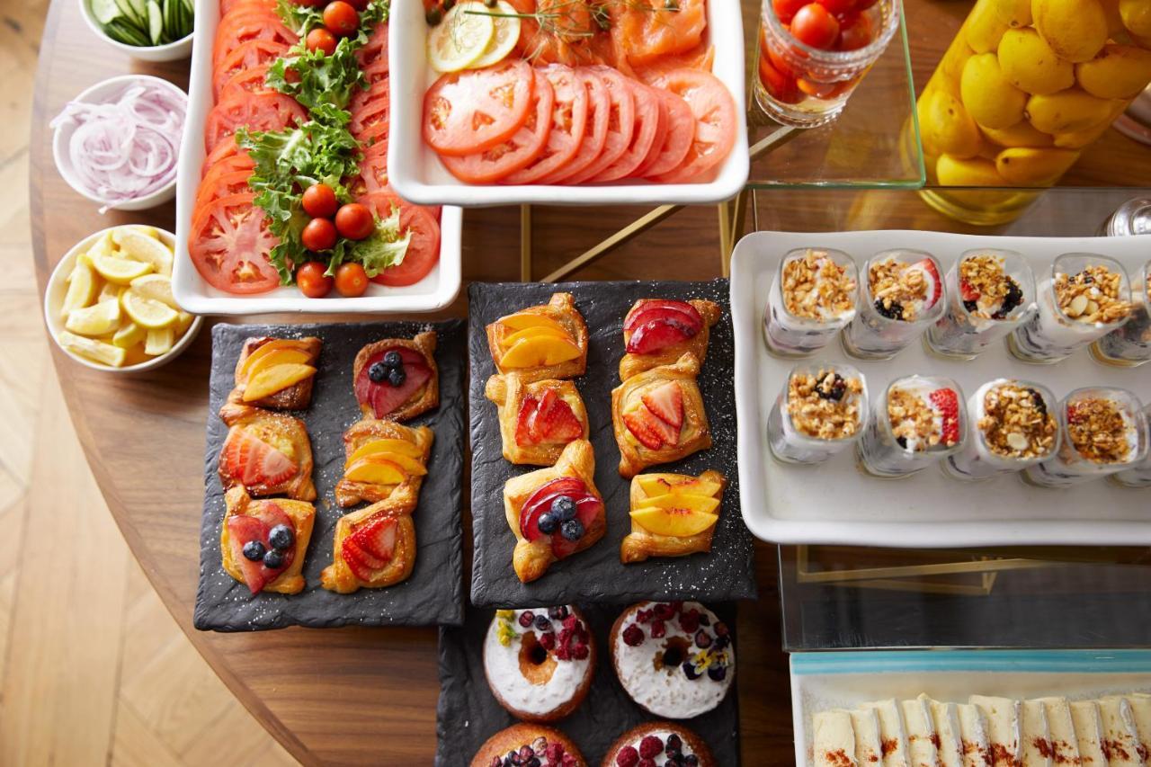 The London West Hollywood At Beverly Hills Exteriör bild A buffet of food